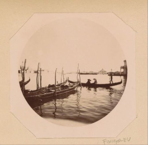 View of gondolas in the lagoon of Venice, in the distance to the right the Santa Maria della Presentazione and to the left the church of San Giorgio Maggiore