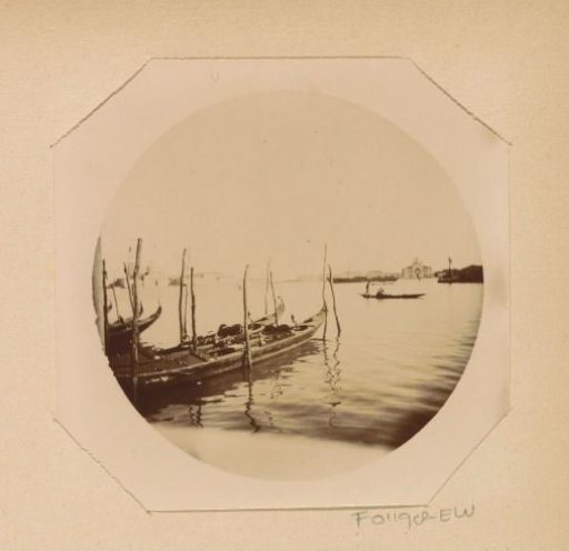 View of gondolas in the lagoon of Venice, in the distance to the right the Santa Maria della Presentazione and to the left the church of San Giorgio Maggiore