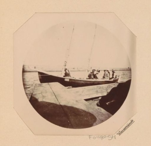 Passengers in a sailing skiff near Warnemünde
