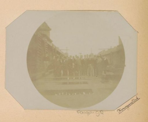 Group photograph of a class from the Public Trade School at the Koninginnedok on the ADM shipyard in Amsterdam