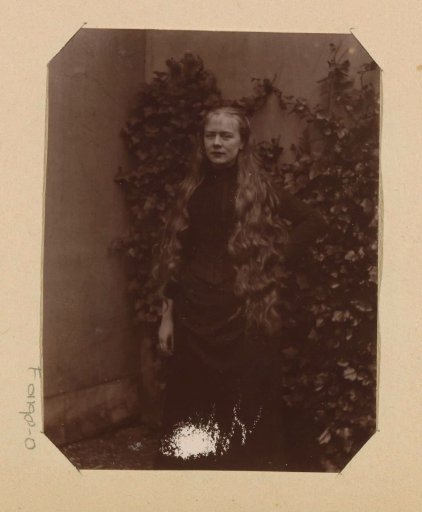 Portrait of an unknown young woman with a braid
