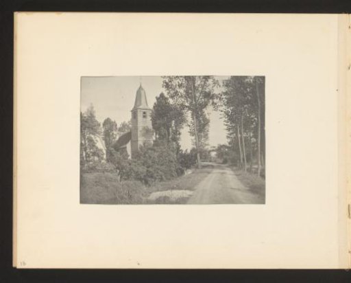 View of a church along a sandy path