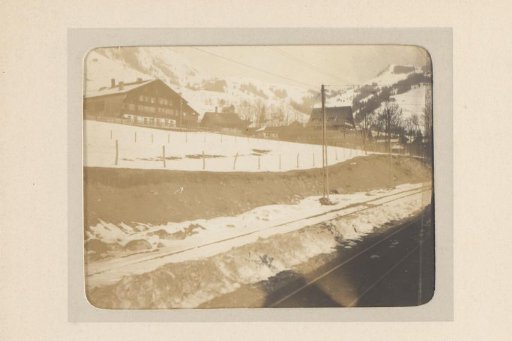 Chalets in the Mountains, Seen from a Train Compartment