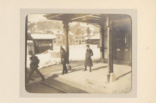 Three Men on a Mountain Platform