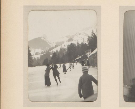 Skaters on a Frozen Mountain Lake