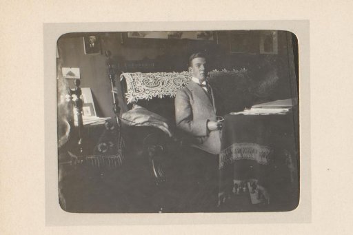 Man sitting on a bench in an interior