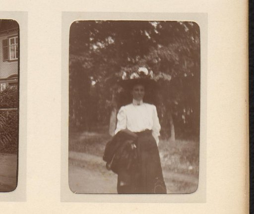 Portrait of an Unknown Woman with Hat and a Coat over Her Arm