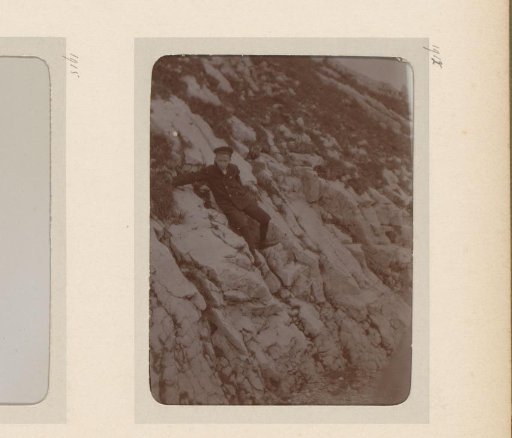 Portrait of a boy climbing on rocks