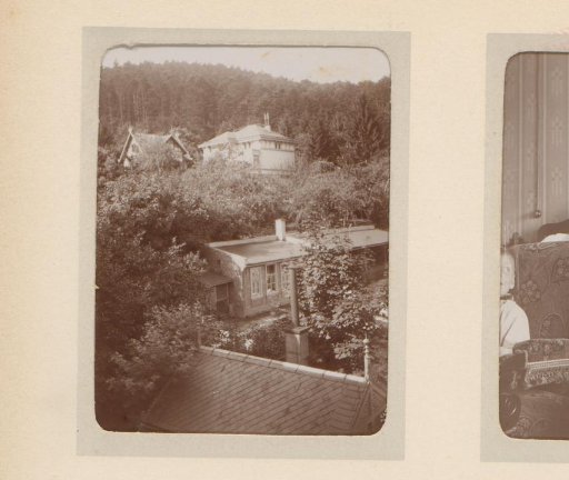 View of Several Houses in a Forest, Possibly Seen from a House