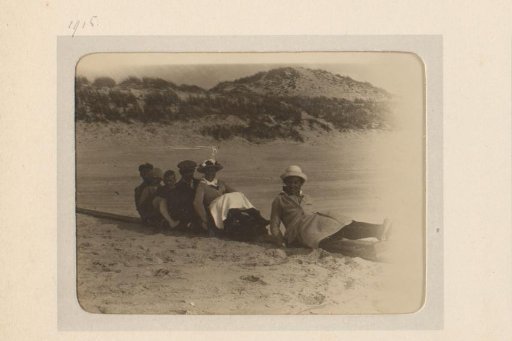 Company Sitting One Behind the Other on a Sled