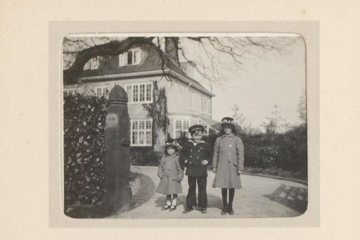 Portrait of Three Children on a Driveway
