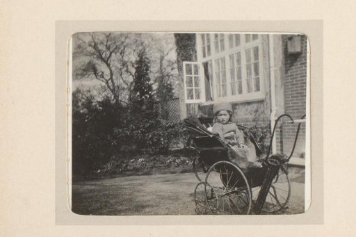 Portrait of a Toddler in a Carriage