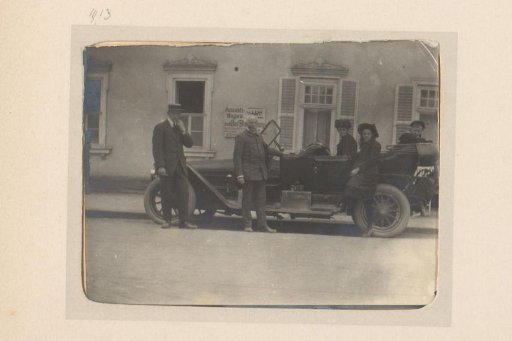 Company with a car, possibly at Oberhof