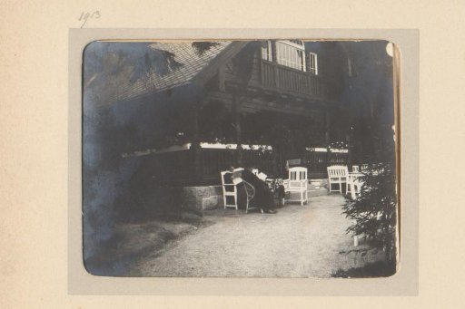 Terrace behind a wooden house