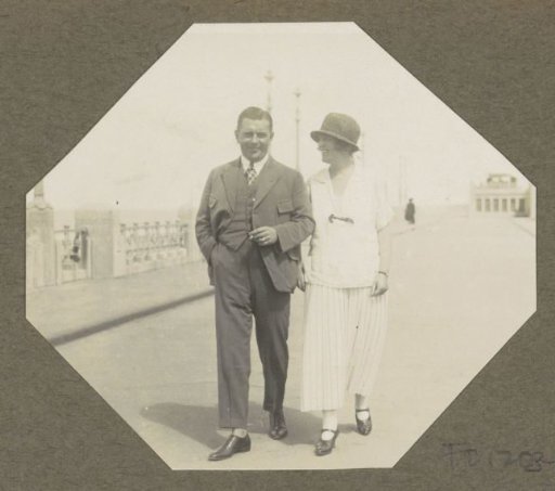 Man and woman walking on the boulevard of Scheveningen