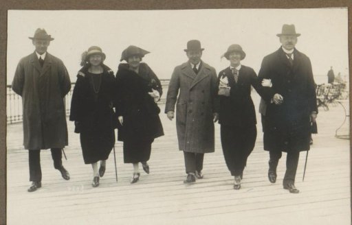 Group walking on (presumably) the pier of Scheveningen
