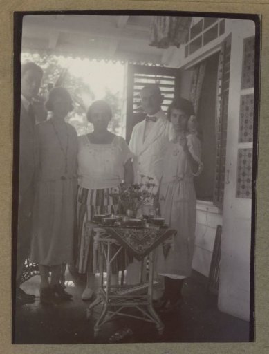 Group on a veranda, possibly in Suriname