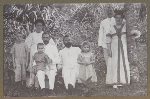 Group with three children, possibly at estate 'Veldlust' in Suriname