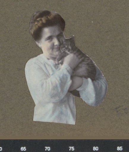 Woman with a cat in her arms, possibly in Paramaribo (cut out)