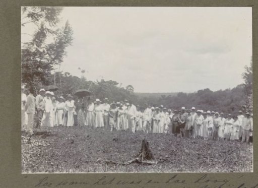 Governor Aarnoud van Heemstra (standing in a dark suit) with a group on the Maäboberg in Suriname