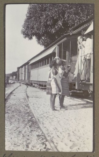 Two Maroon women selling their wares to train passengers
