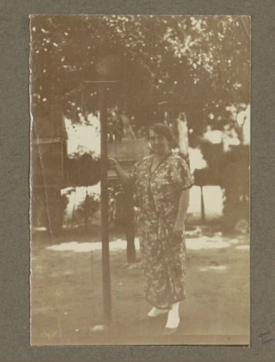 European woman posing with a monkey in Suriname