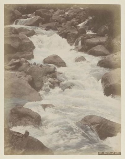 Rapids and boulders near the village of Kiga