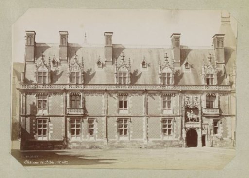 Facade on the courtyard of the Château of Blois with a relief of Louis XII on horseback on the right