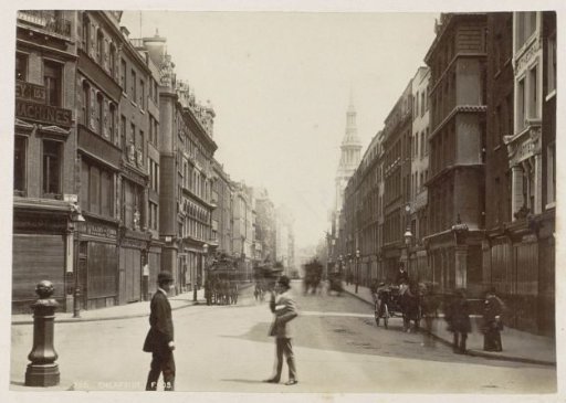 Passers-by and horse-drawn carriages in Cheapside in London, with the church of St Mary-le-Bow in the background