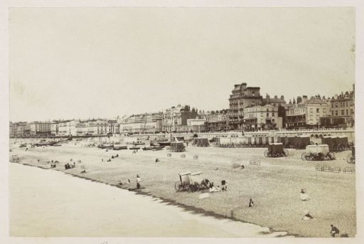 Buildings, bathers and bathing carriages on Brighton beach