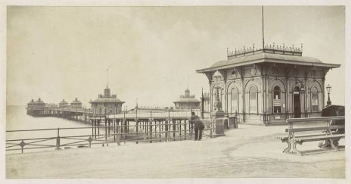 View from land of a pier with buildings, presumably Brighton West Pier, in Brighton, Sussex County, built between 1863 and 1866