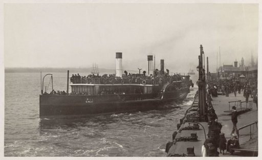 Ferry with passengers at the quay in New Brighton, Liverpool