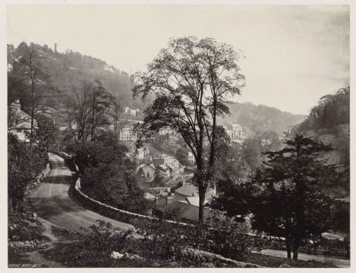 Panoramic view of houses and a road against a ridge in Matlock