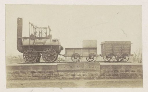Locomotive with carriages on a plinth