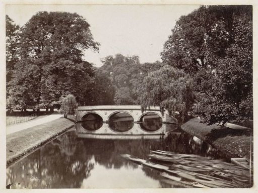 Bridge at Trinity College in Cambridge, with rowing boats in the foreground