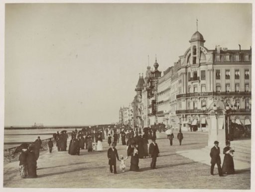 Boulevard with walkers and Hotel Royal Belge in Ostend