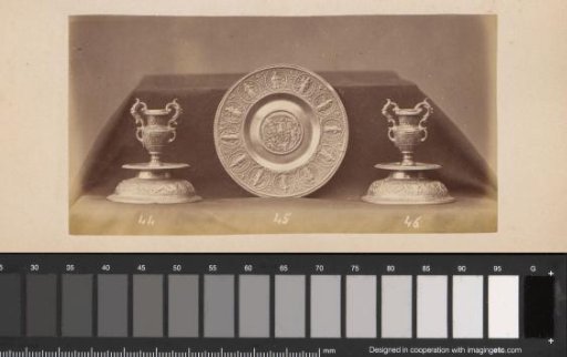 Metal candlesticks in Contarini model and a plate