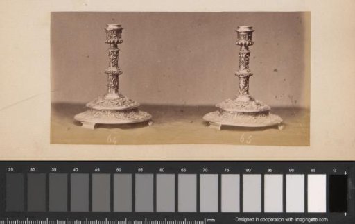 Two metal candelabras