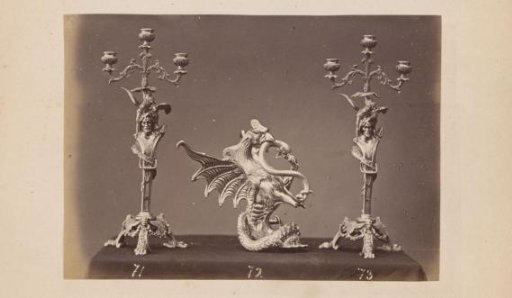 Metal candelabras, busts and caryatids