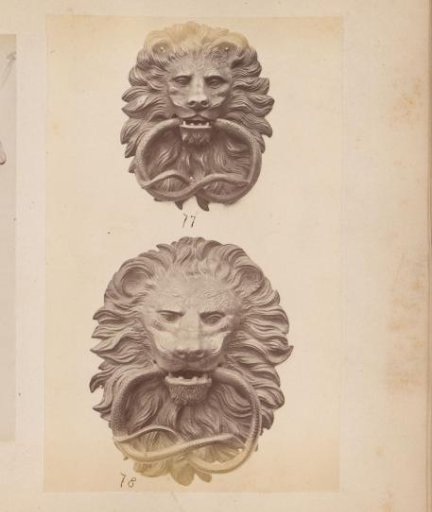 Metal door knockers in the form of lions