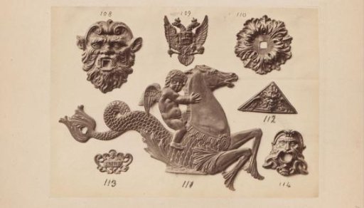 Metal ornaments in the form of heads and seahorses
