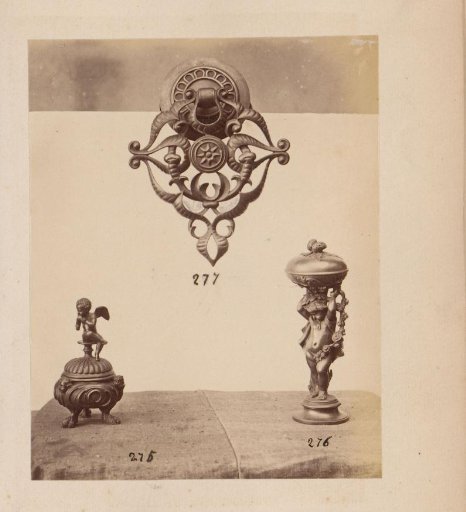 Two metal vessels and a door knocker