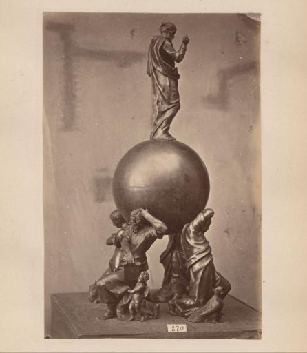 Metal vessel supported and crowned by figures