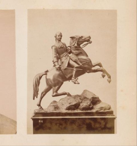 Metal sculpture of a horseman, member of the Persico family