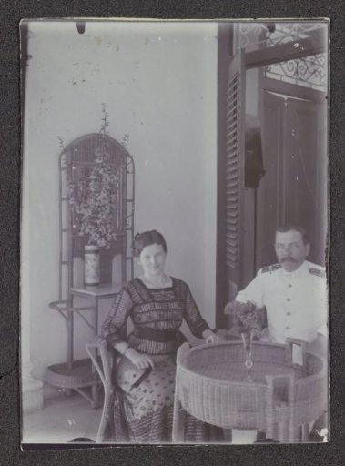 Man and a woman on a veranda in Surabaya (Simpang)