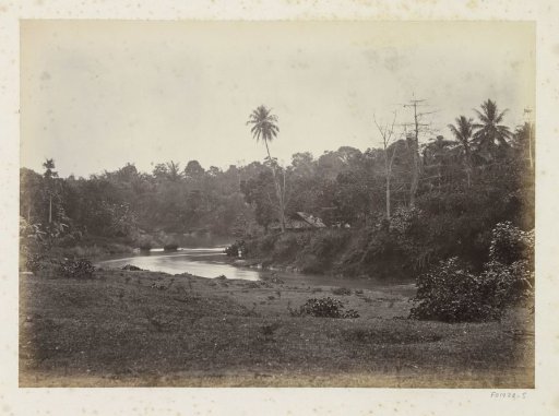 House on a river in Java