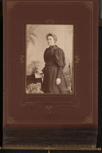 Portrait of a Standing Woman with a Book