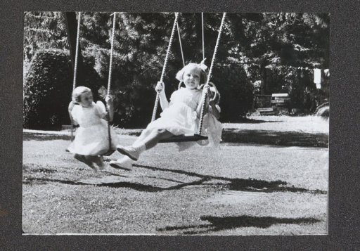 Princess Beatrix and two other children on a swing