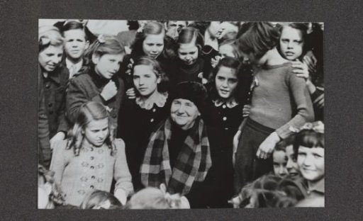 Portrait of Queen Wilhelmina among a group of children