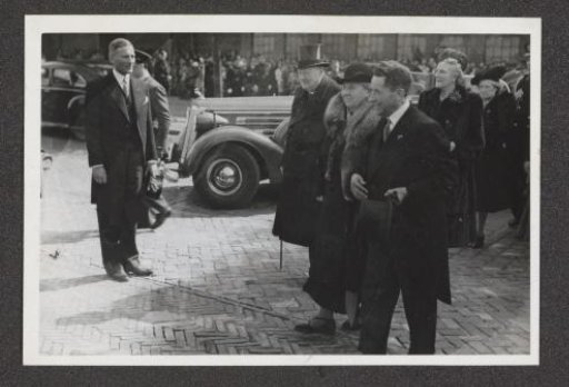 Queen Wilhelmina, Mr. Churchill, and Alderman Schokking on the De Ruyterkade in Amsterdam